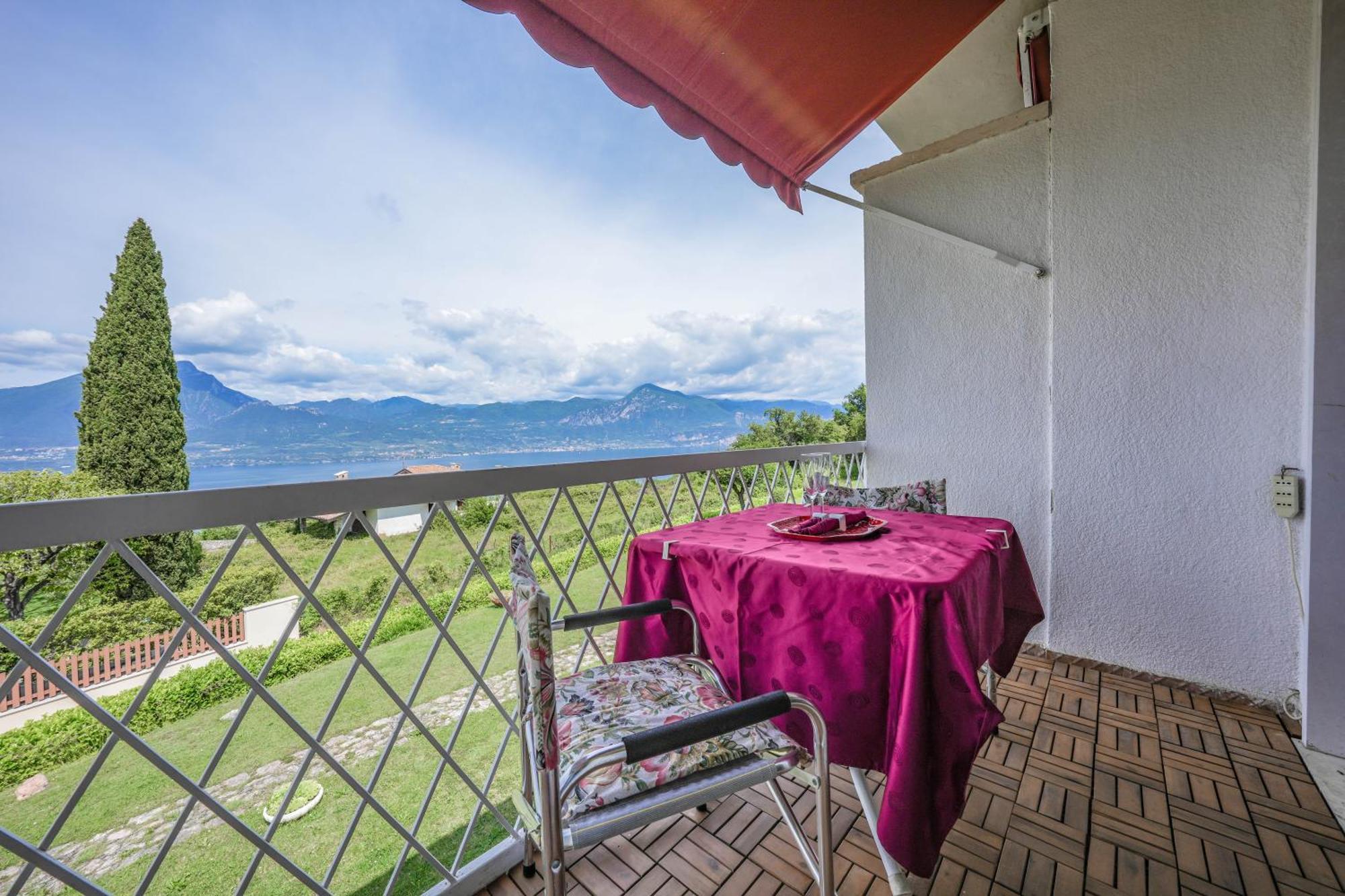 Апартаменты Garda Panoramic House Альбизано Экстерьер фото