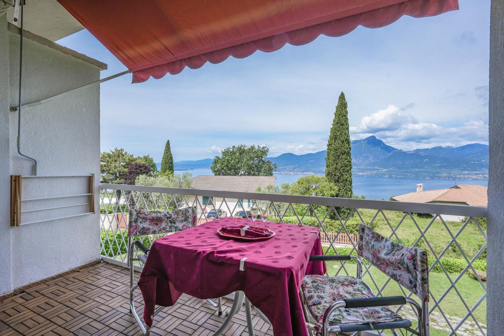 Апартаменты Garda Panoramic House Альбизано Экстерьер фото